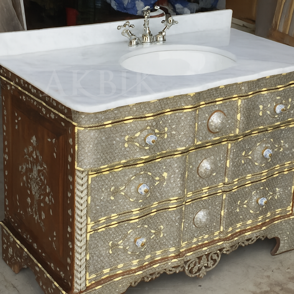 Decorative bathroom vanity with marble countertop and ornate design