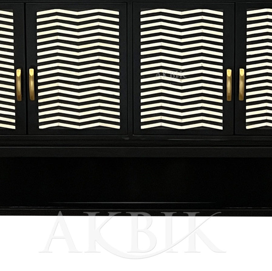 A black sideboard with a geometric chevron pattern on the front, featuring an inlay design and gold-colored handles.