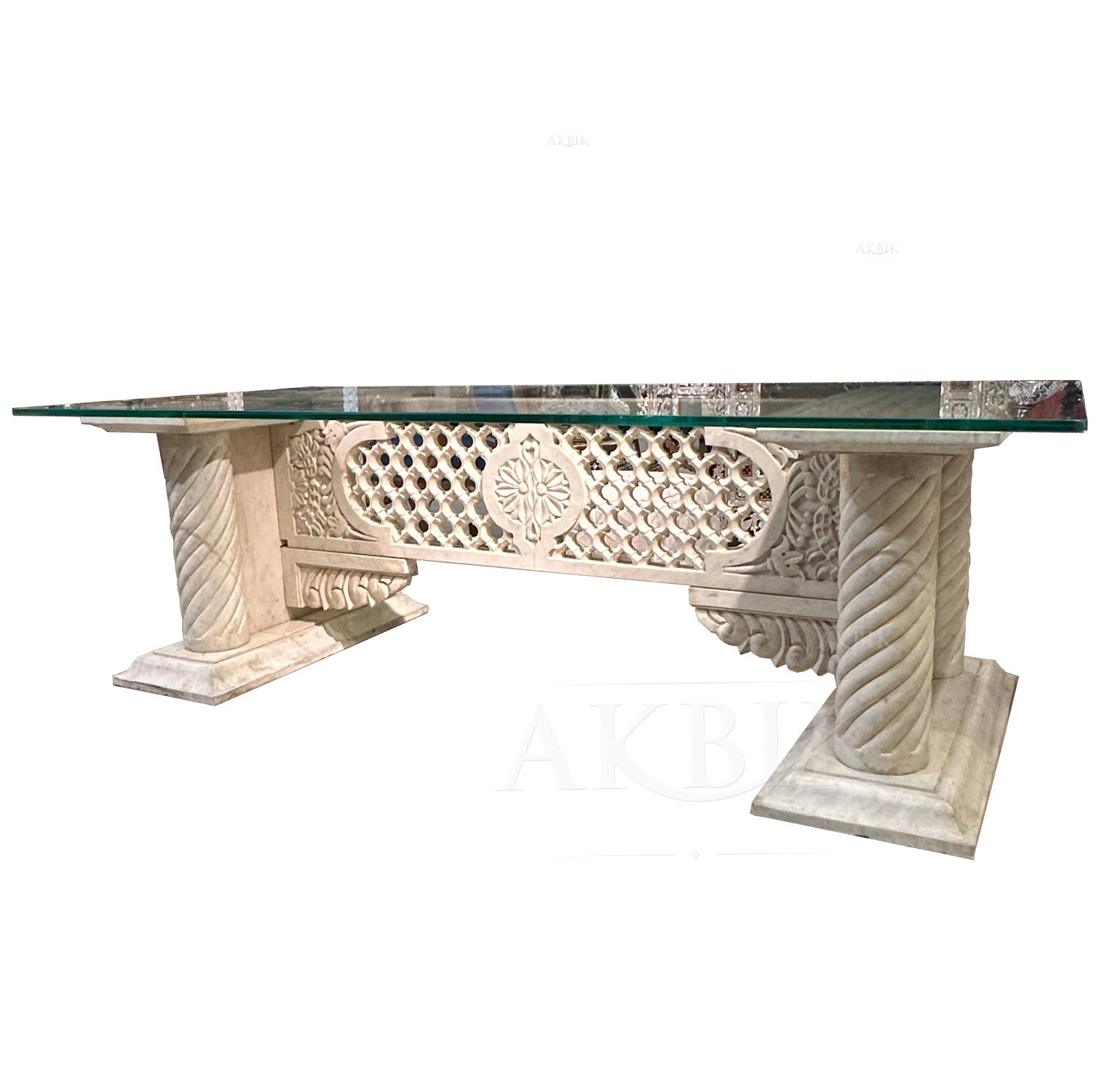 A rectangular marble dining table - DESK ALTERNATIVE with intricate carvings on the legs and a polished marble top, showcasing a luxurious design by Akbik furniture & design