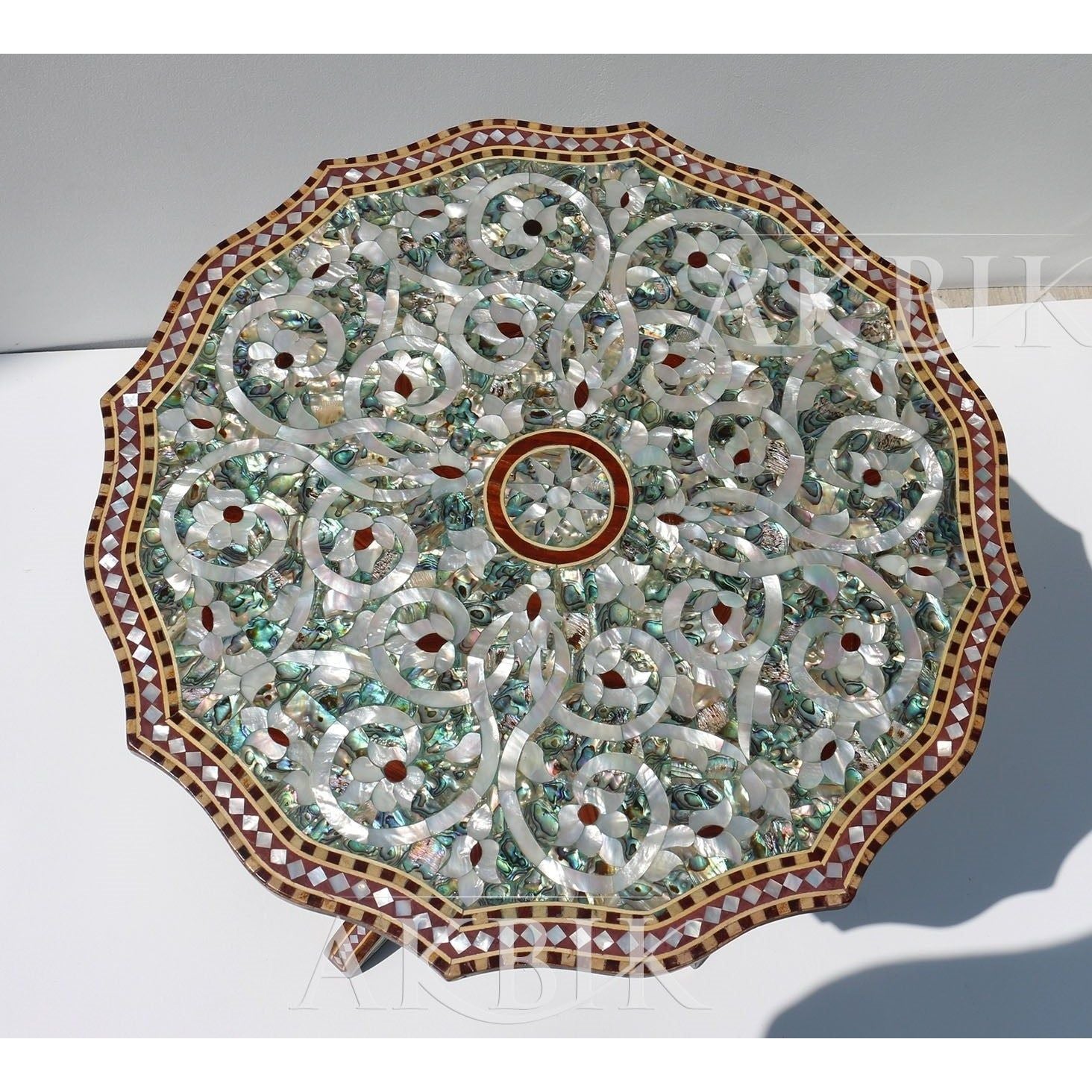 Top of a side table handcrafted Awith balone & mother of Pearl inlaye: Luminous Aurora Design