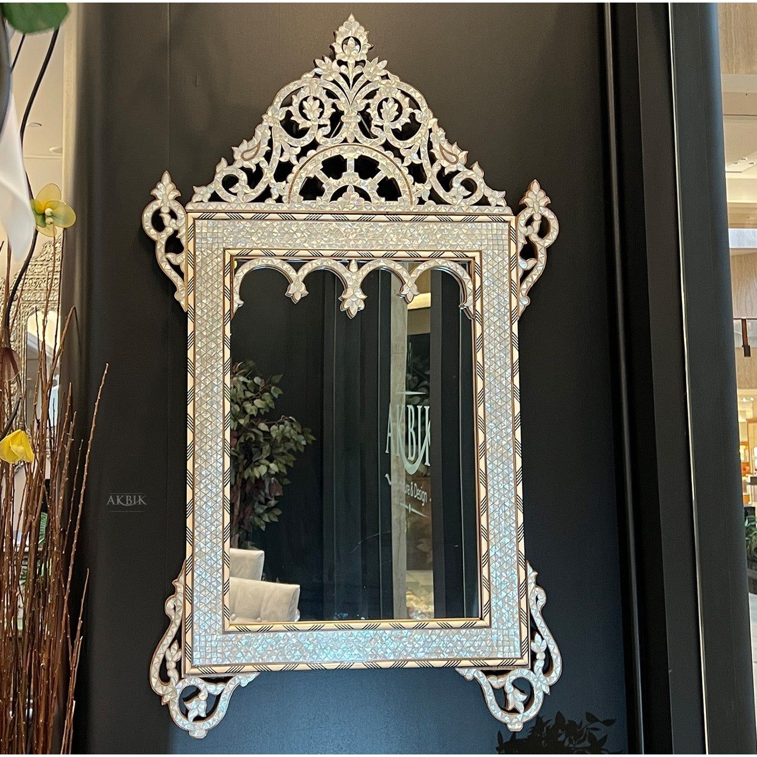 Mirror handcrafted with intricate designs using mother of pearl and camel bone inlays on solid walnut by Akbik Furniture & Design