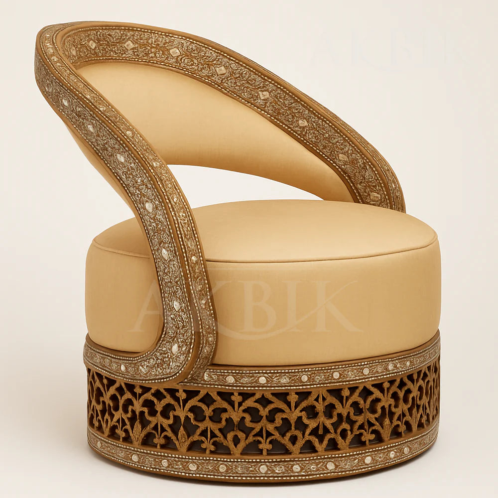 A luxurious custom modern armchair with Syrian inlay, featuring a hand-carved walnut wood frame with floral and geometric patterns, upholstered in a light color, and a circular base with ornate latticework and mother-of-pearl accents.