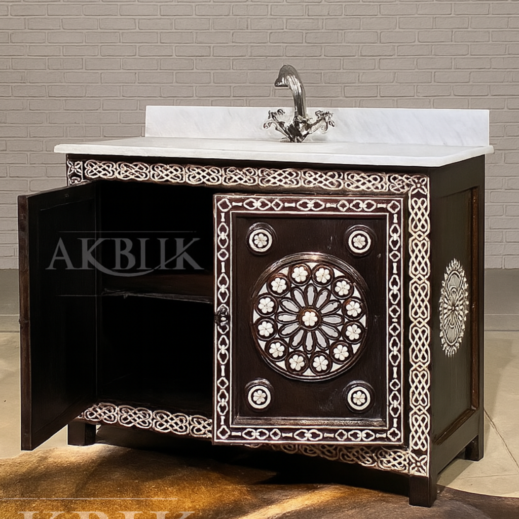 Decorative bathroom vanity with intricate designs on a tiled wall background