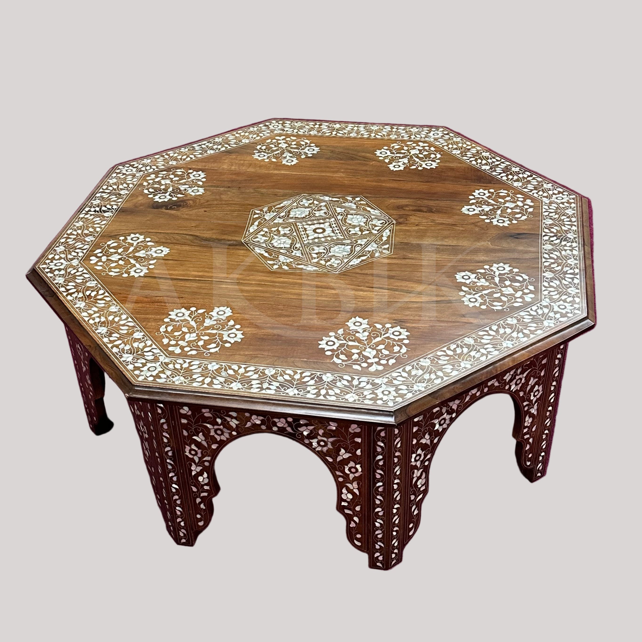 Coffee table inlaid with mother of pearl on walnut by Akbik inc 