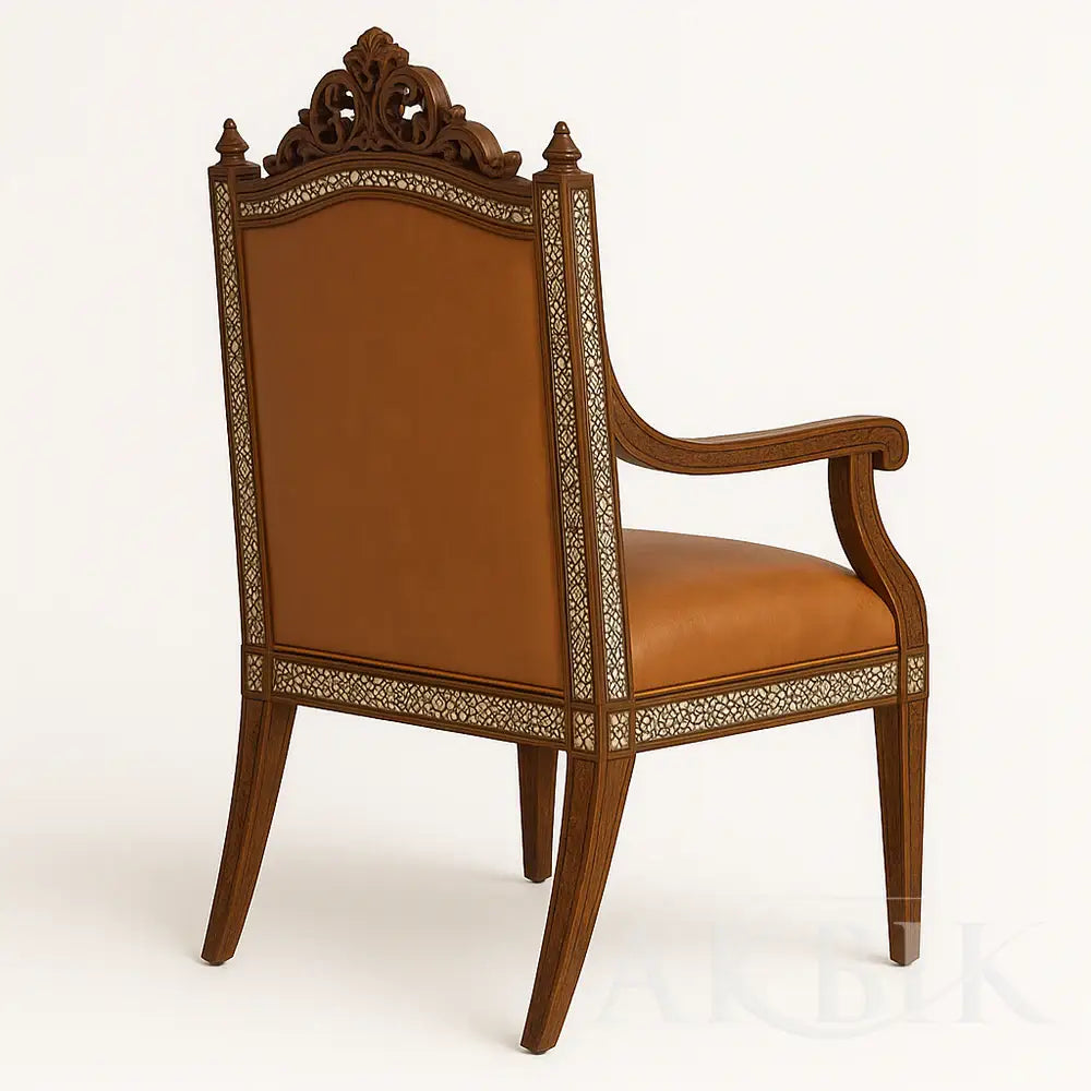 Decorative wooden chair with brown leather seat and backrest on a white background.