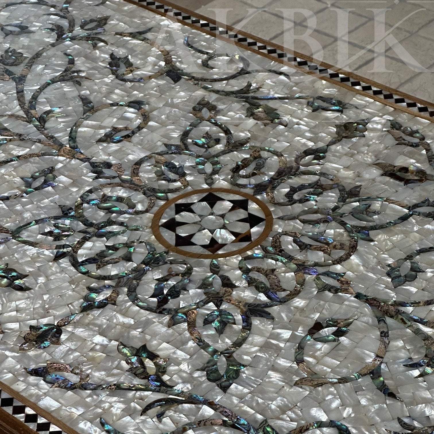 Decorative inlaid table top with intricate patterns