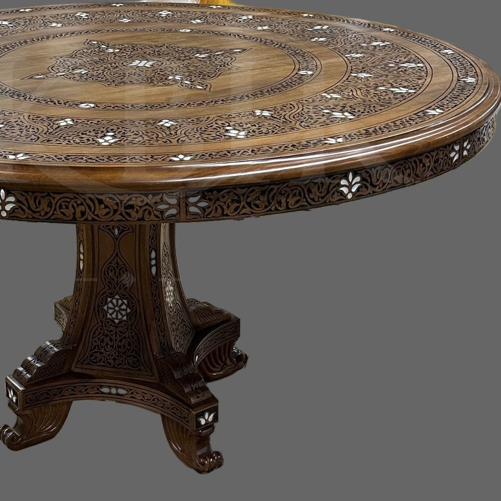 Decorative wooden table on a cardboard floor with a room in the background