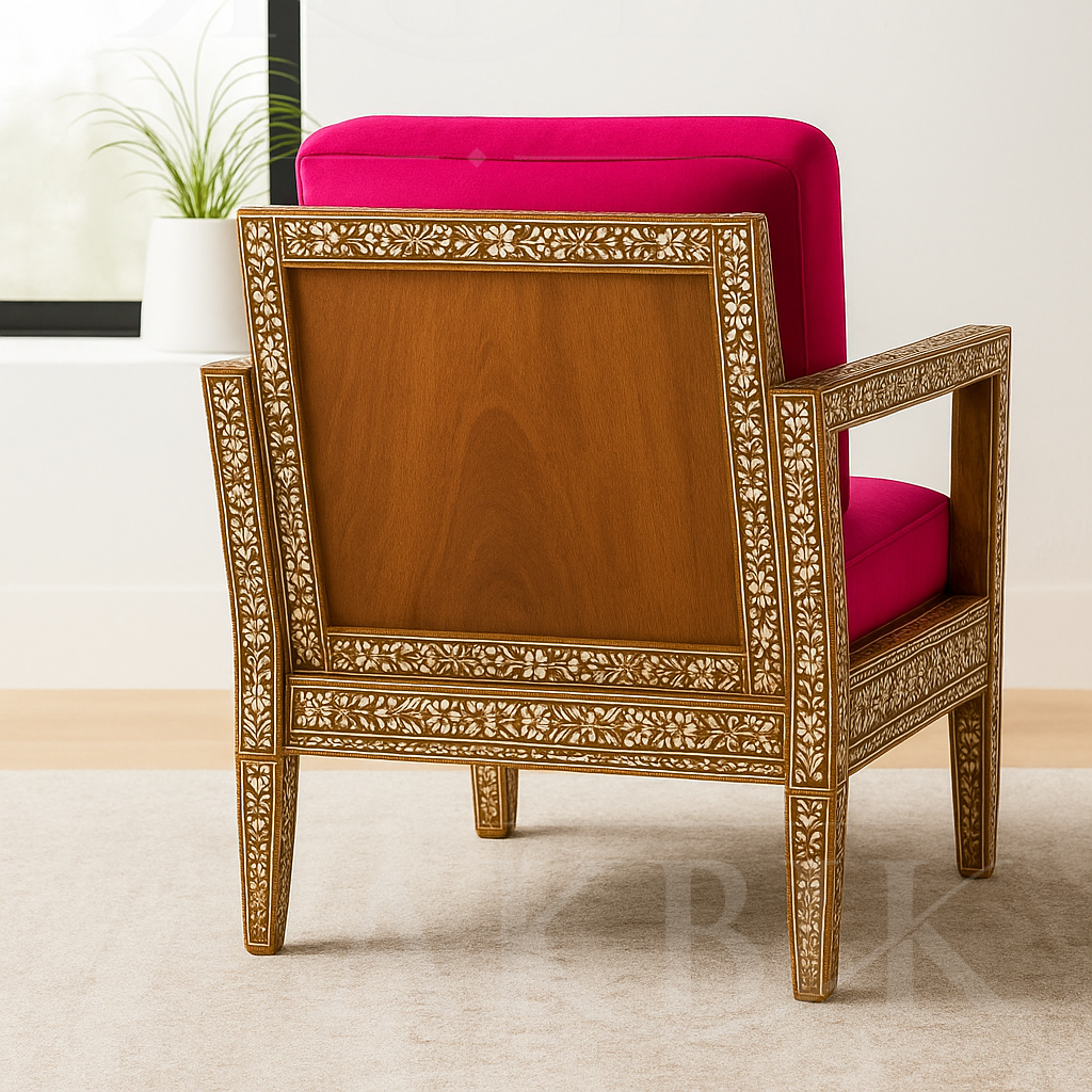 Chair with pink cushion and gold intricate armrests on a neutral mother of pearl background by Akbik funriture & Design 