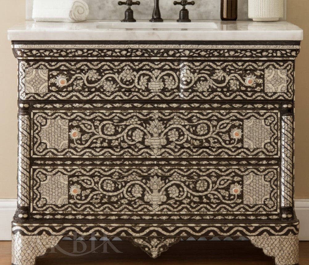 Decorative vanity with intricate patterns and marble top