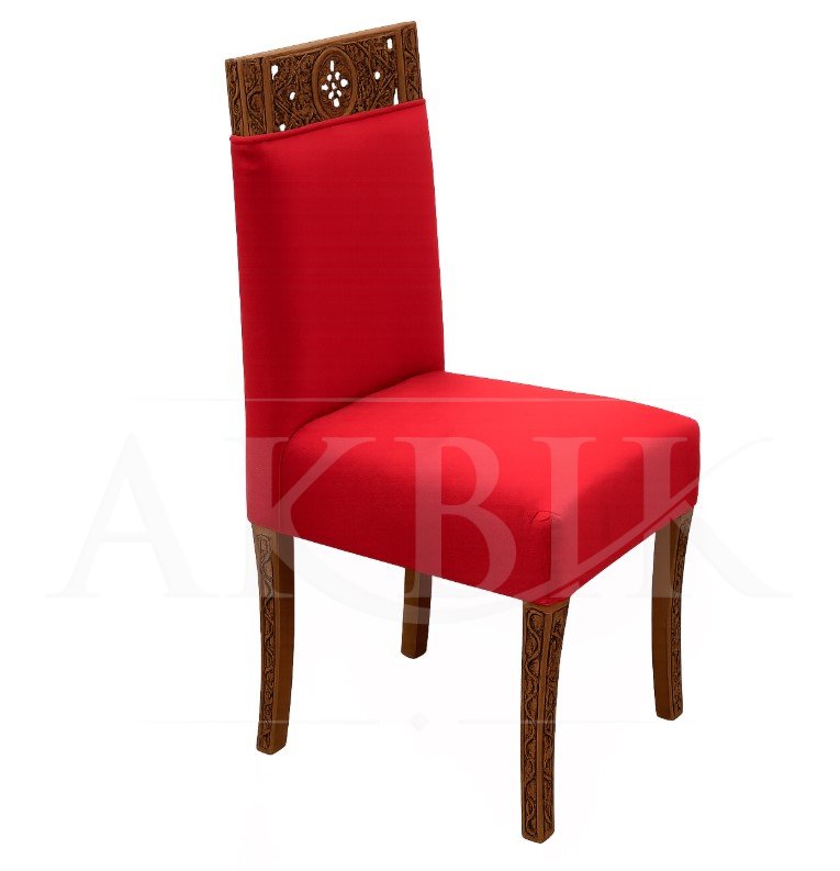 Red chair with wooden accents on a white background