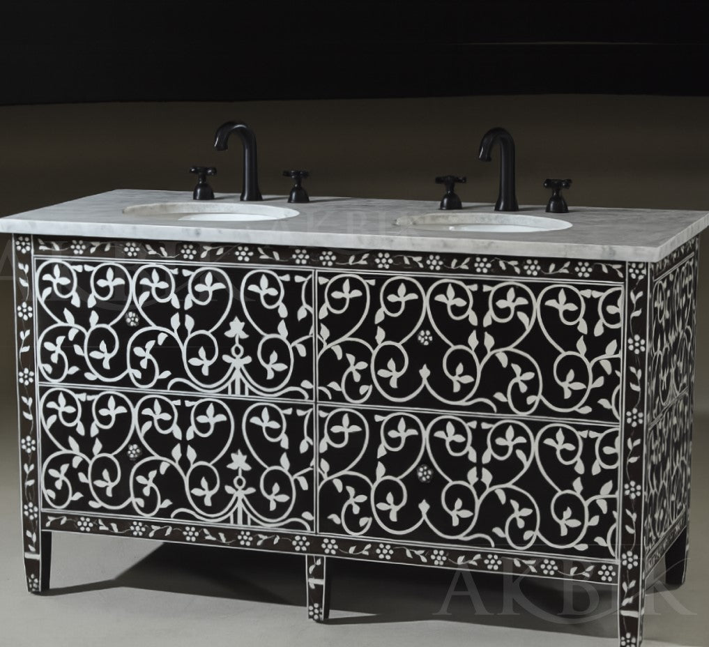 Bathroom vanity with decorative black and white pattern on a dark background