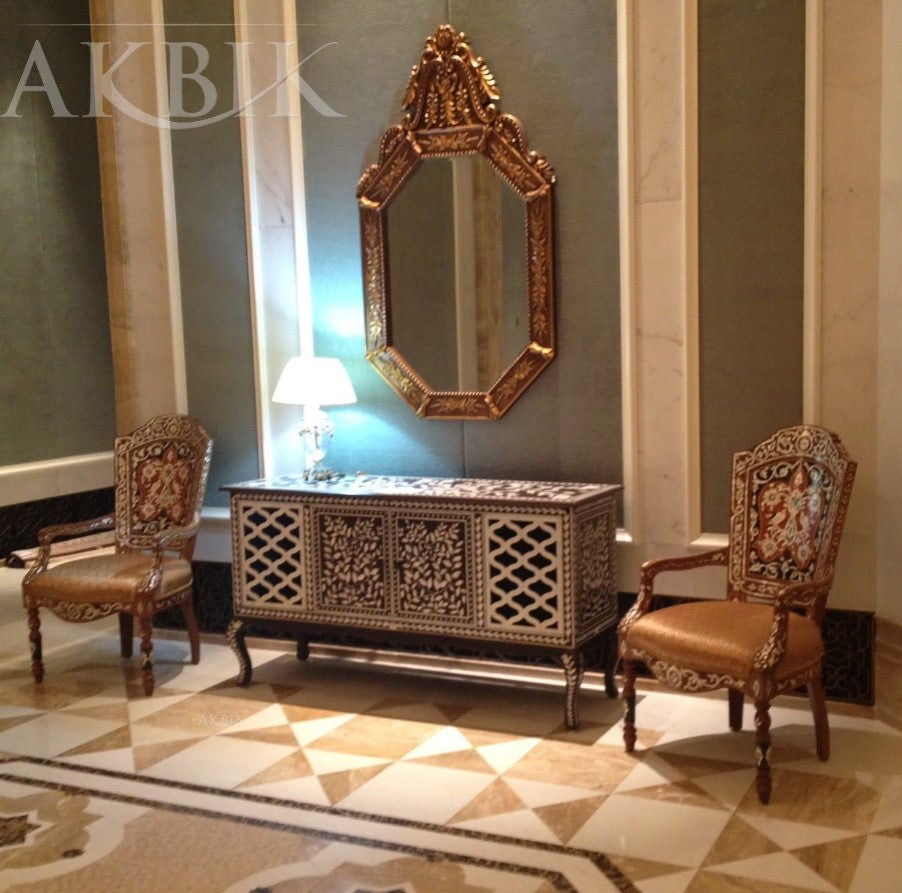 Decorative room with ornate furniture and mirror, featuring the brand 'AKBIK'.