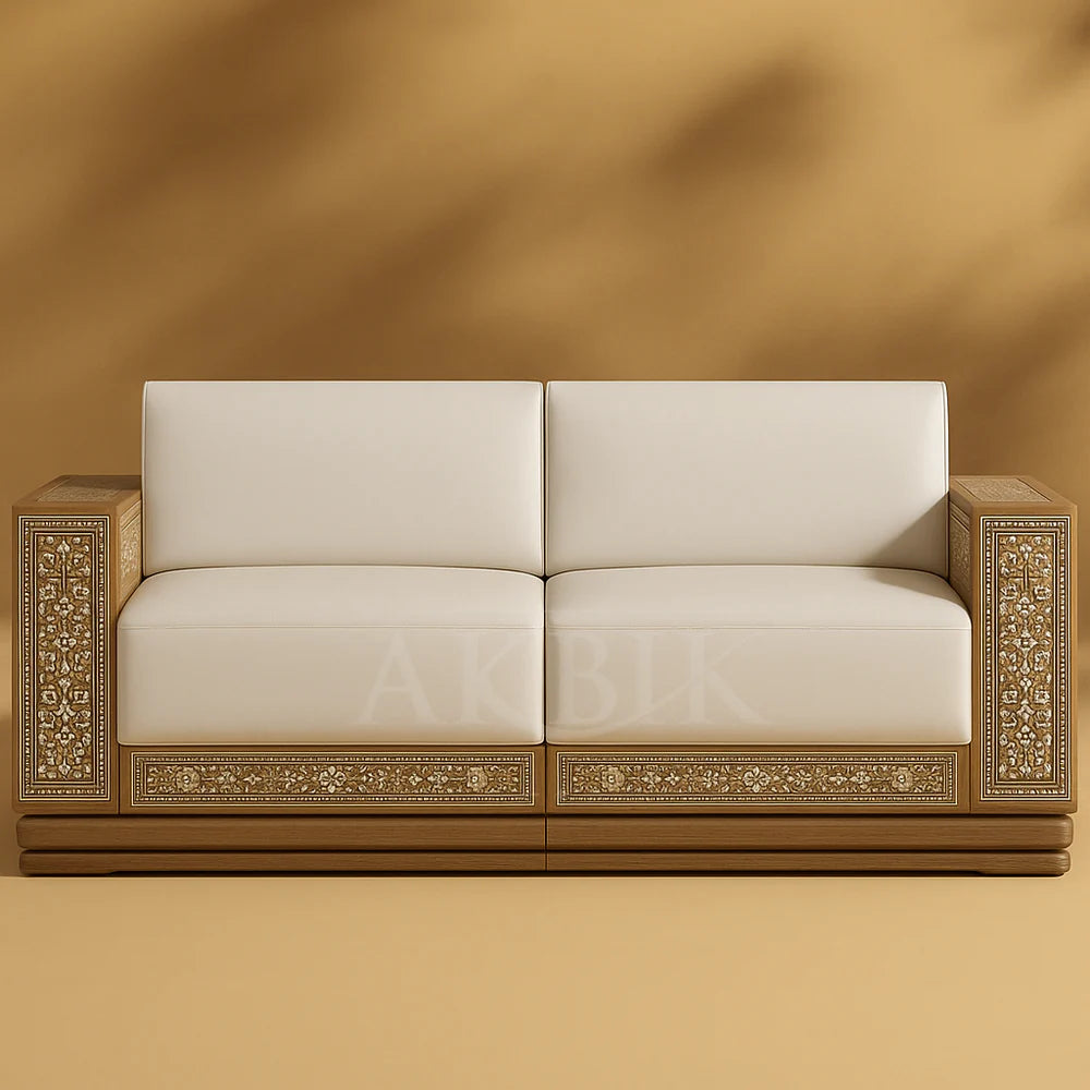 An off-white leather sofa with intricate hand-carved walnut wood frame and mother-of-pearl inlay, featuring a solid walnut base structure with built-in storage compartments.